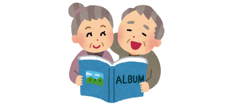 アルバムを見ている老夫婦のイラスト